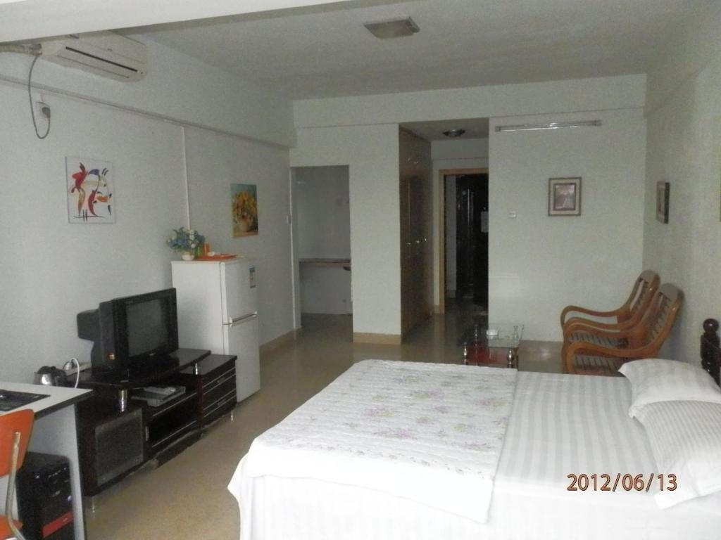 Xingfu Hotel Nanning Rum bild