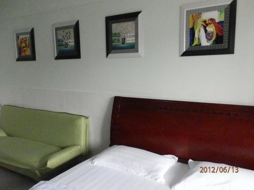 Xingfu Hotel Nanning Rum bild