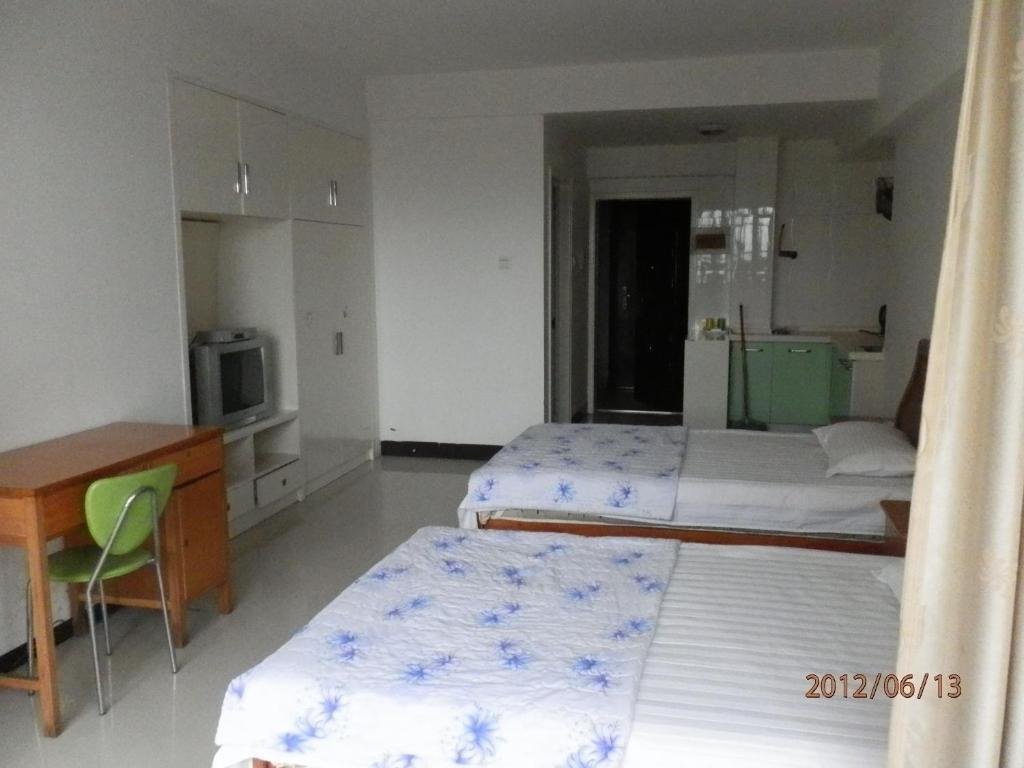 Xingfu Hotel Nanning Rum bild
